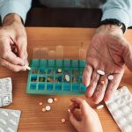 Senior,Man,Organizing,His,Medication,Into,Pill,Dispenser.,Senior,Man